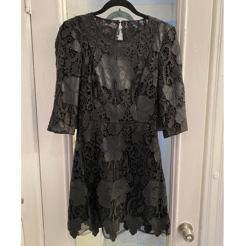 Vegan Leather embroidered dress.